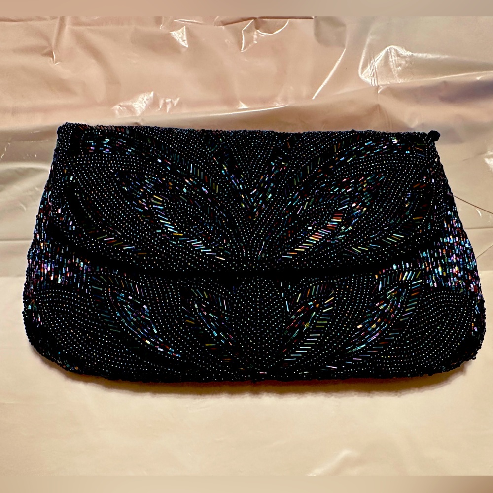 Small beaded Preston and York clutch handbag with a shoulder chain in navy.